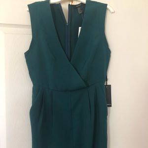 Emerald green jumpsuit .